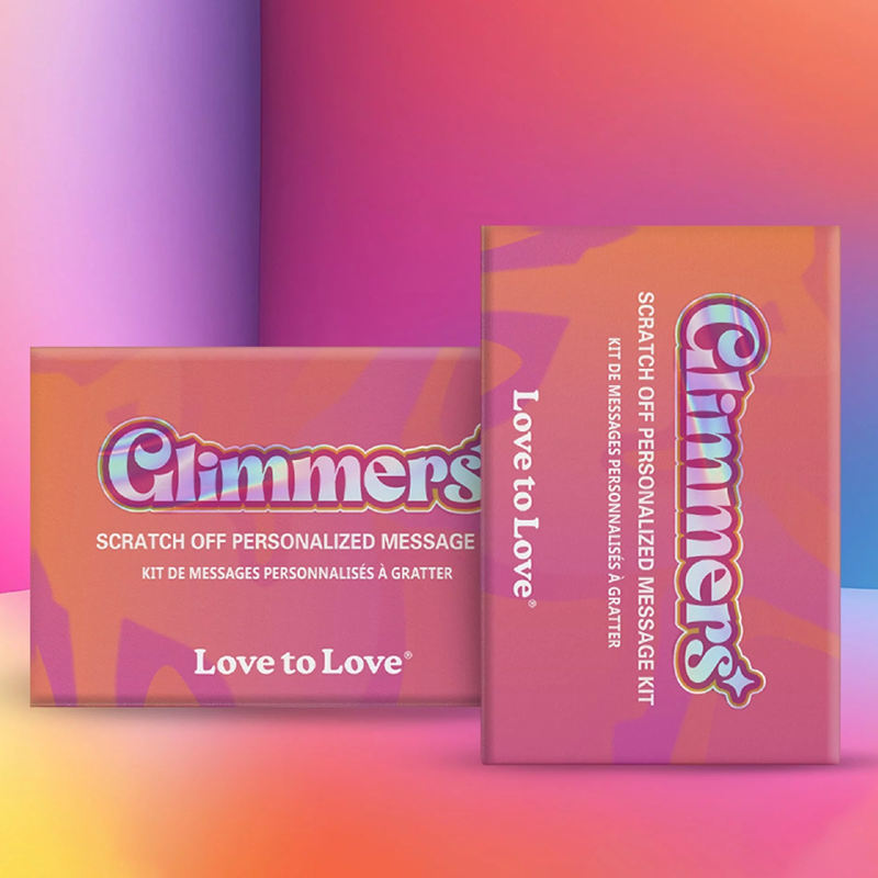 Two boxes of "Glimmers" scratch-off message kits with holographic lettering.