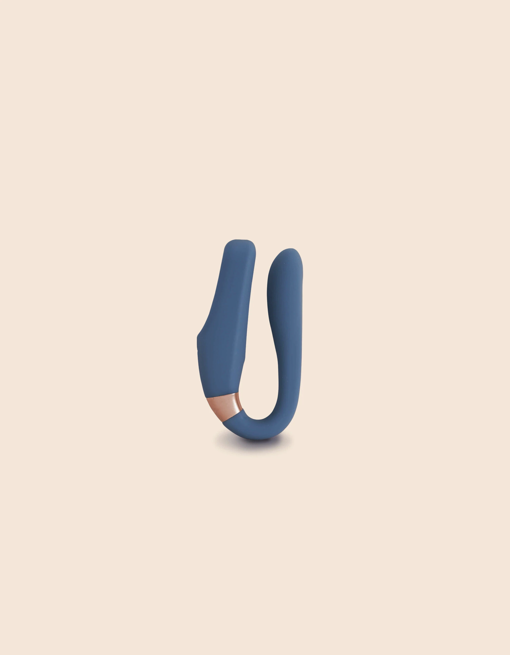 Blue wearable remote control vibrator with rose gold accent.