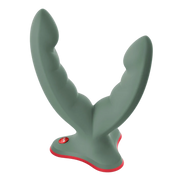 A grey ridged straddle toy with a red button and trim.