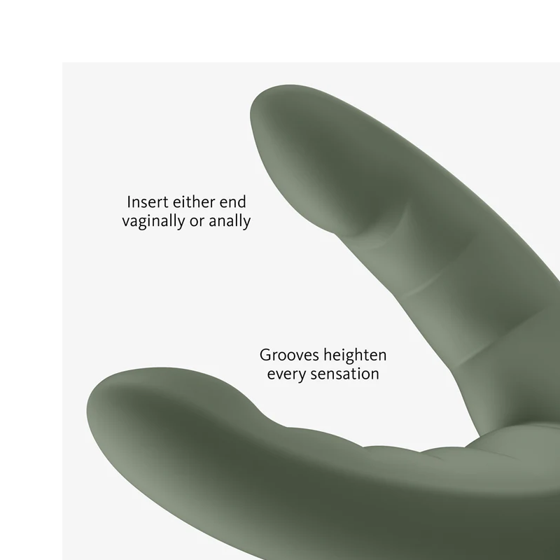 A green dual-ended toy with ridges, labeled for vaginal or anal use.
