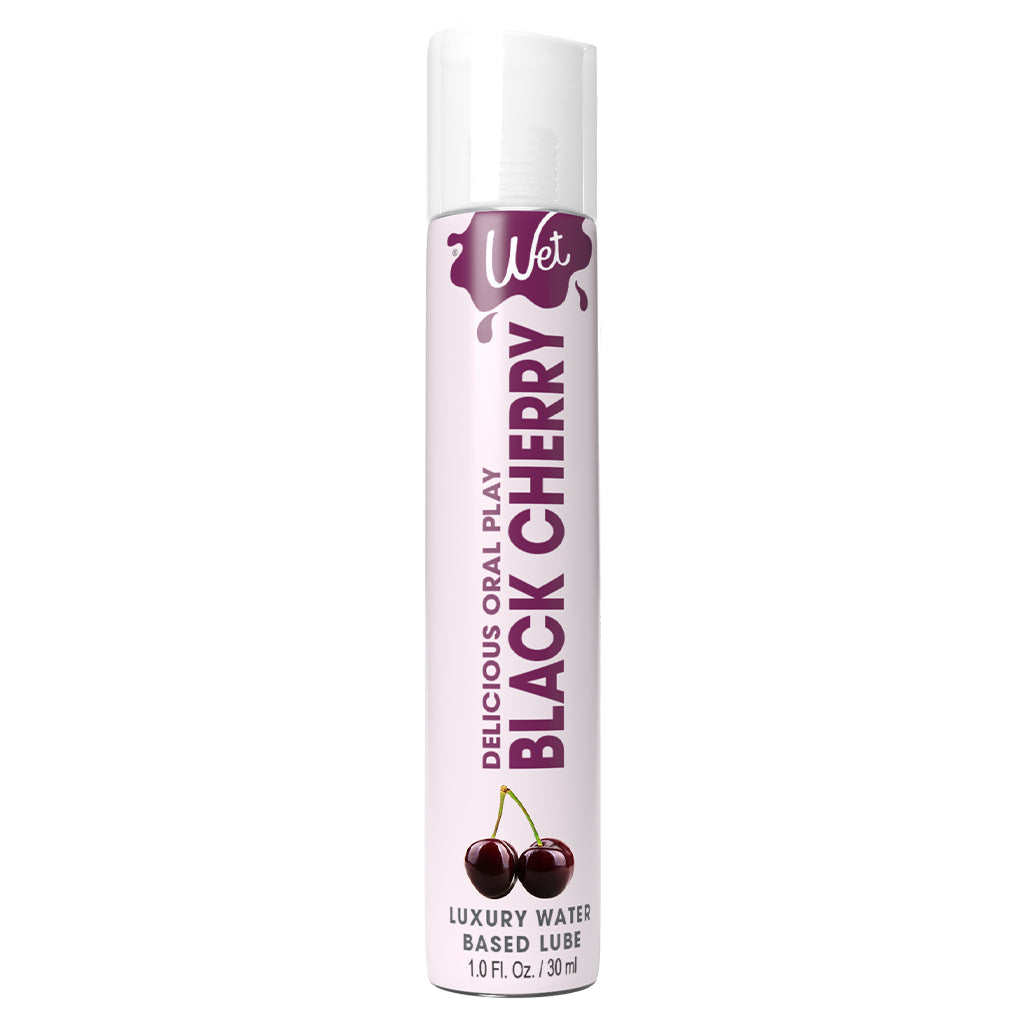 Wet Black Cherry flavored water-based lubricant in a bottle with cherries.