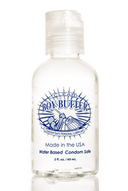 Clear Boy Butter water-based personal lubricant in a clear bottle.