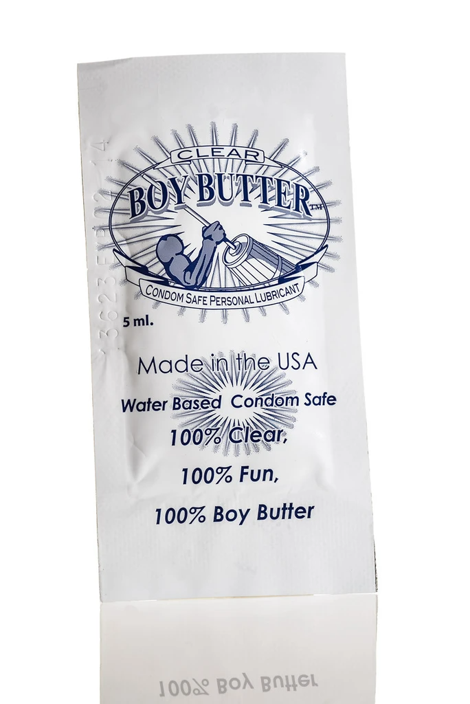 Single-use packet of Boy Butter clear water-based personal lubricant.