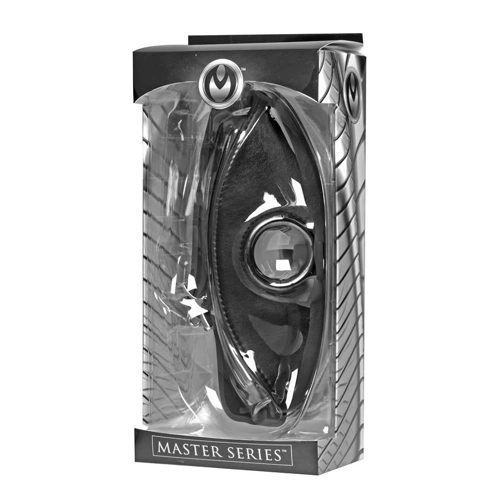 Black leather muzzle-style feeder gag with a metal ring in packaging.
