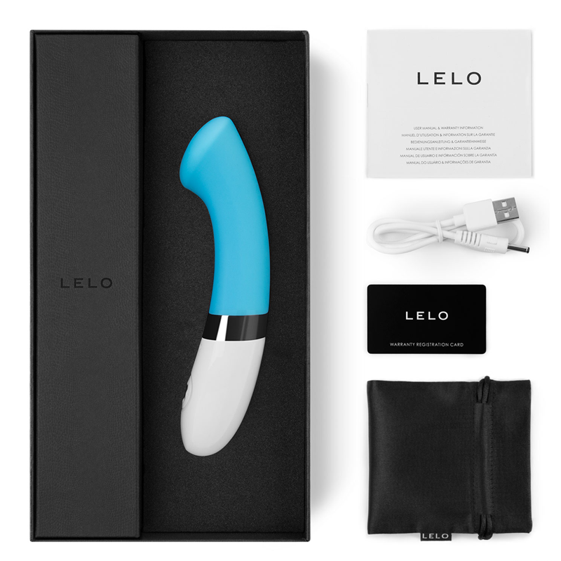 A blue and white Lelo Gigi 2 G-spot vibrator in its box with accessories.