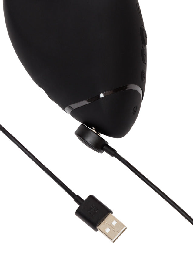 Black dual stimulator with USB charging cable.
