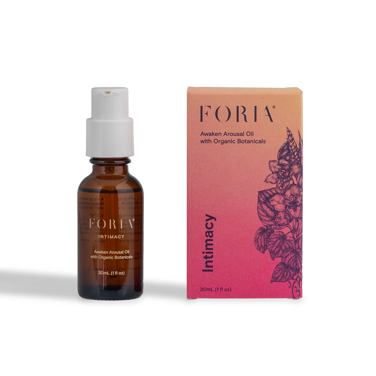 Foria Awaken Arousal Oil in a brown bottle next to its pink and orange box.