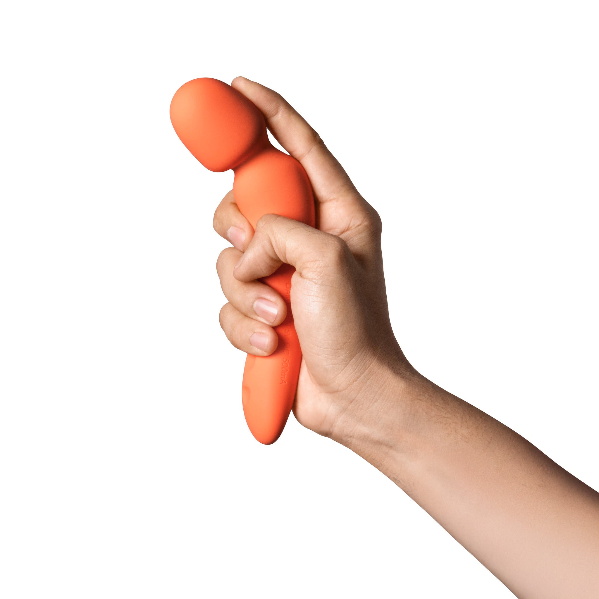 Orange silicone mini wand vibrator held in a hand.