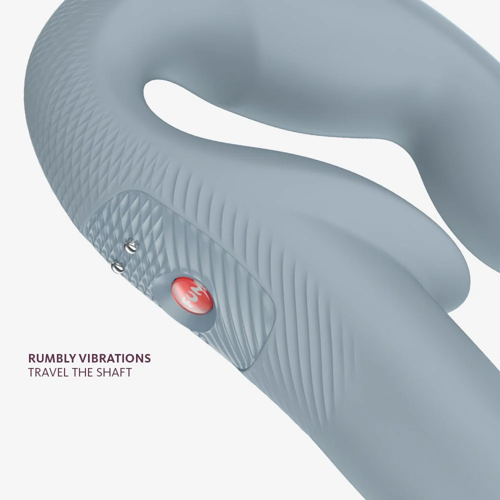 A light blue dual stimulating vibrator with a red button and textured grip.
