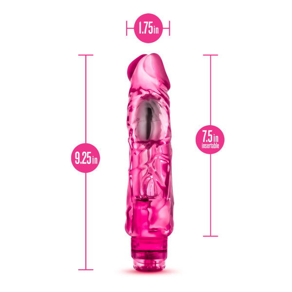 A pink textured vibrator with dimensions indicated.