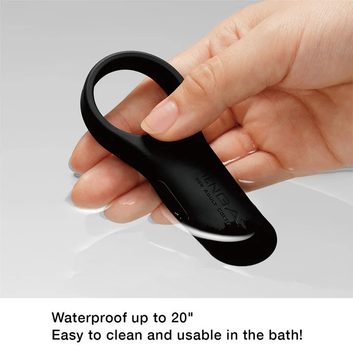 Black Tenga SVR+ rechargeable silicone vibrating cock ring held in a hand.