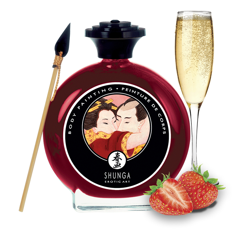 Edible body paint bottle with strawberries, champagne, and a painting tool.