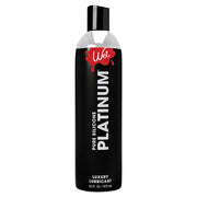 Wet Platinum long-lasting silicone lubricant in a black bottle.