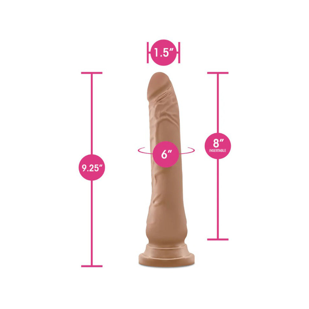 A 9.25-inch blush dildo with measurements for length, insertable length, and width.