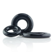 Three black stretchy cock rings of varying sizes.