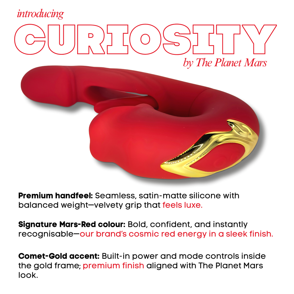 Red silicone vibrator with gold accent and text.