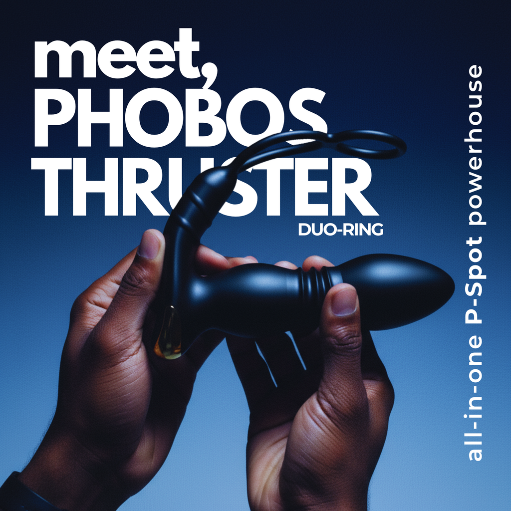 Black prostate vibrator with duo-rings held by two hands.