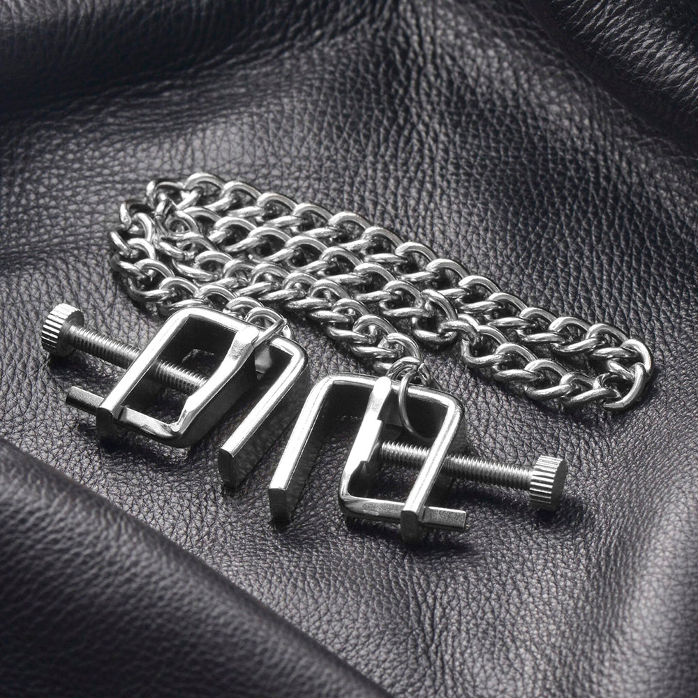Adjustable silver metal nipple clamps with a chain.