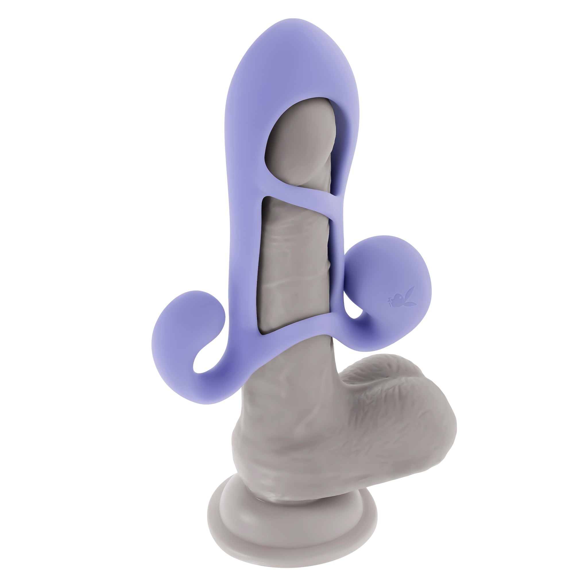 A grey penis enhancer cage with a purple silicone harness and two balls.