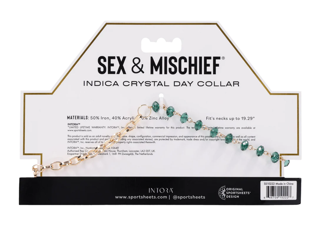 Gold chain collar with green crystals and a gold lock and key.
