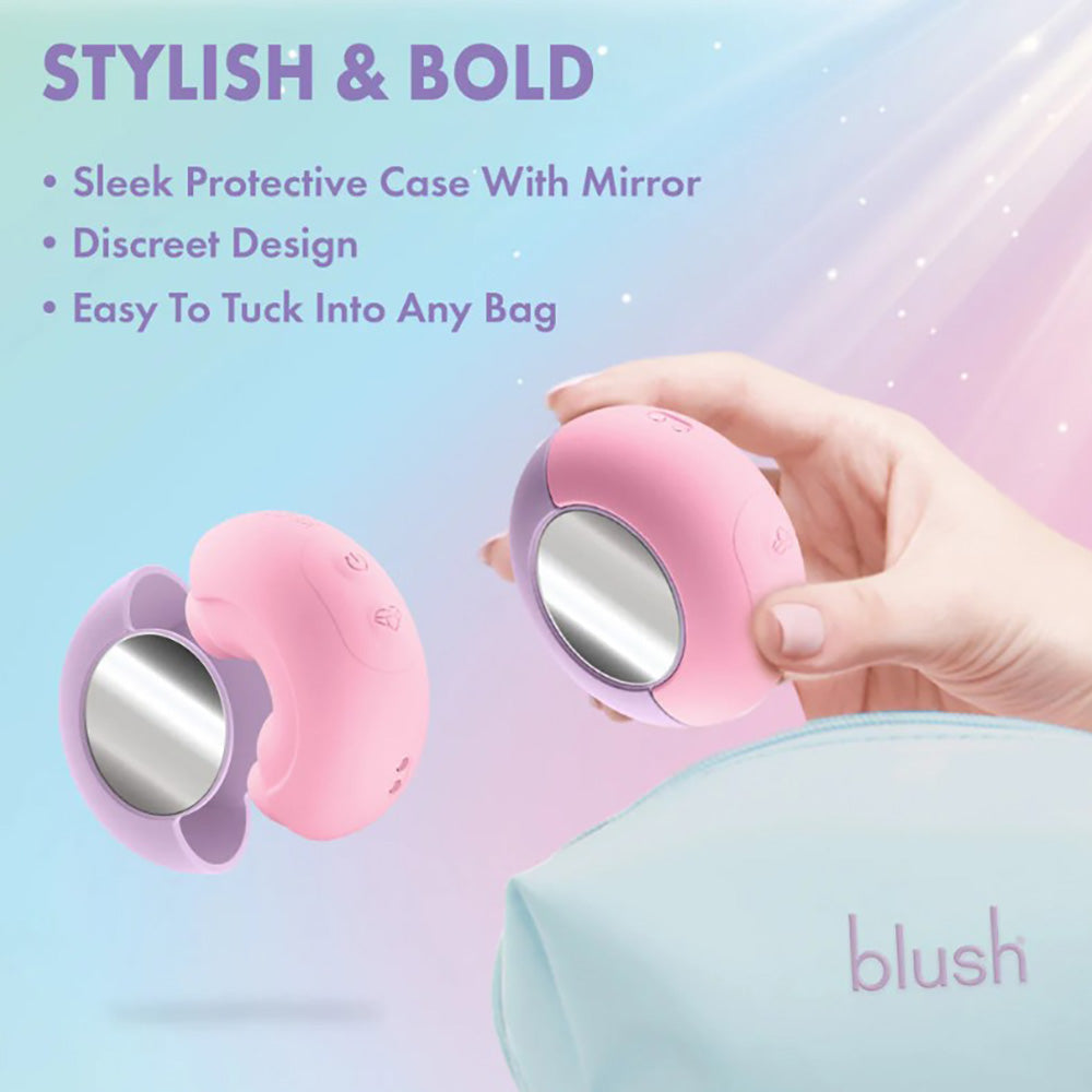 Pink and purple dual-ended vibrator with a mirror in a cosmetic bag.