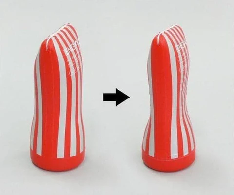 Tenga Ultra Size Soft Tube Male Masturbator in red with white stripes.