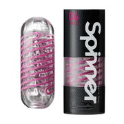 Tenga Spinner 06 Brick reusable male masturbator with pink spiral design.
