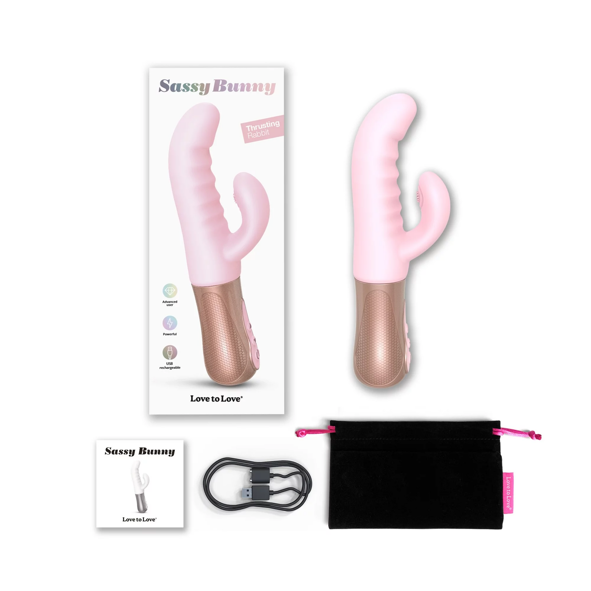Pink Sassy Bunny rabbit vibrator with thrusting and tapping features, shown in box with charger and pouch.