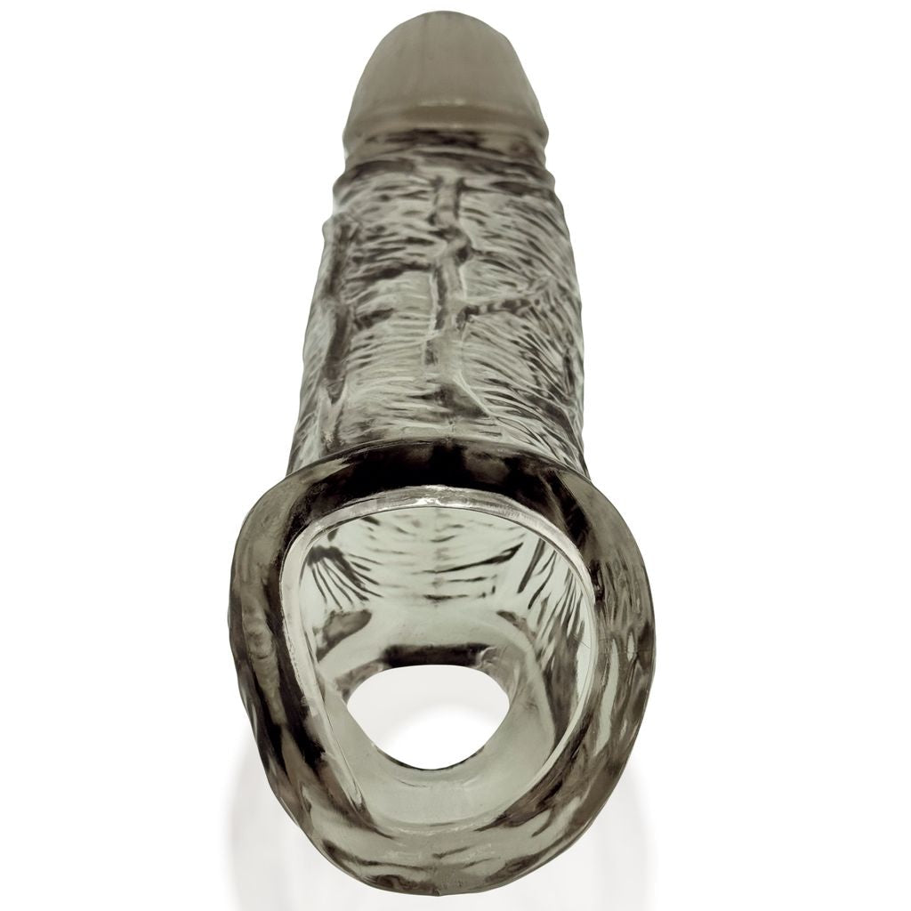 A textured, clear cock sheath with a rounded tip and a wide base.