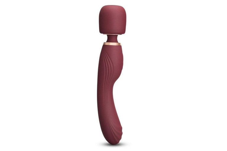 Maroon silicone vibrating wand with a textured handle and rounded head.