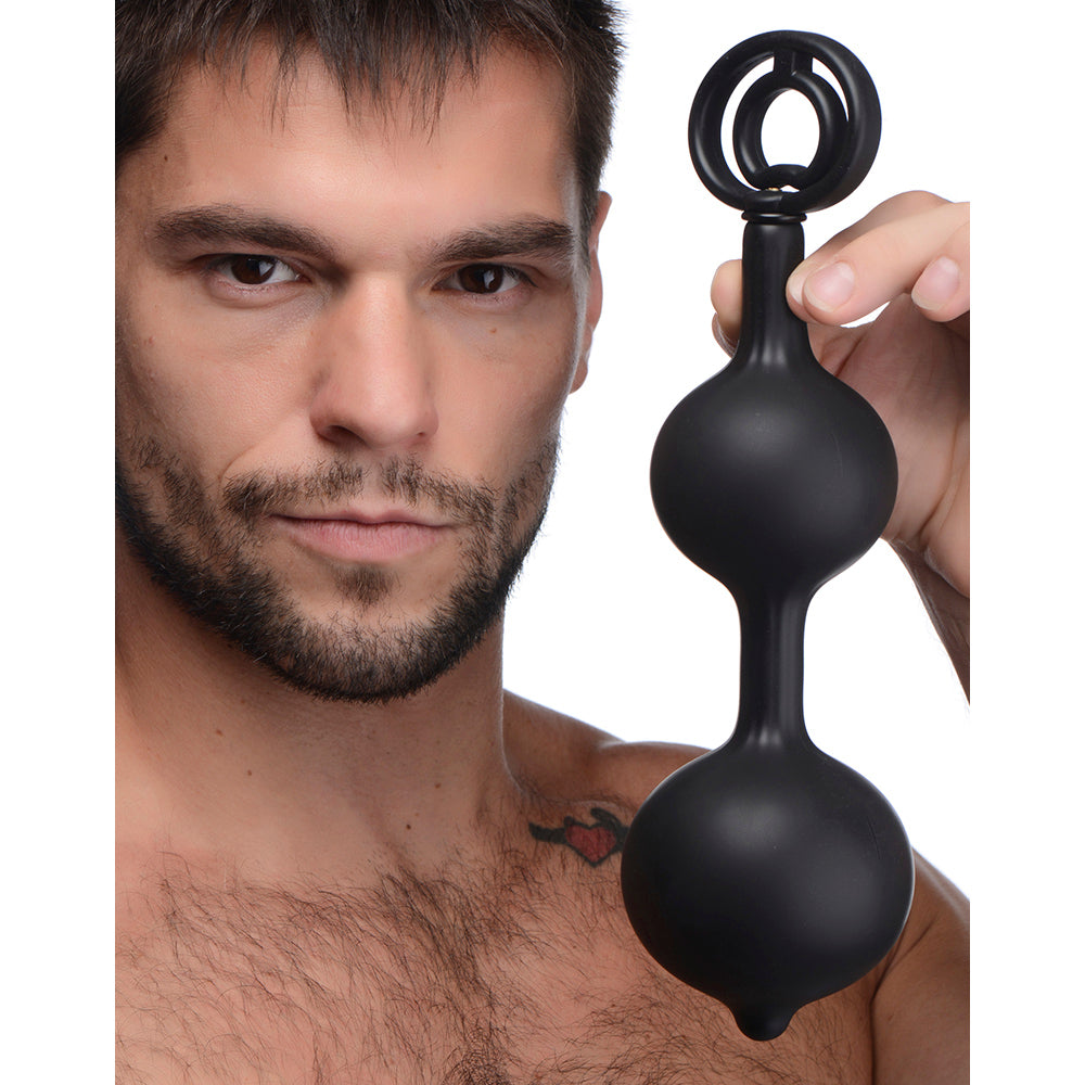 Inflatable silicone anal plug with cock ring.