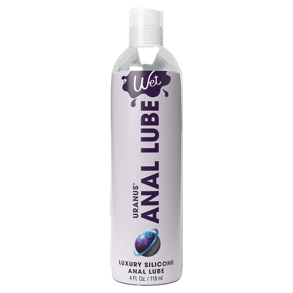 A bottle of Wet Anal Lube with a purple planet graphic.