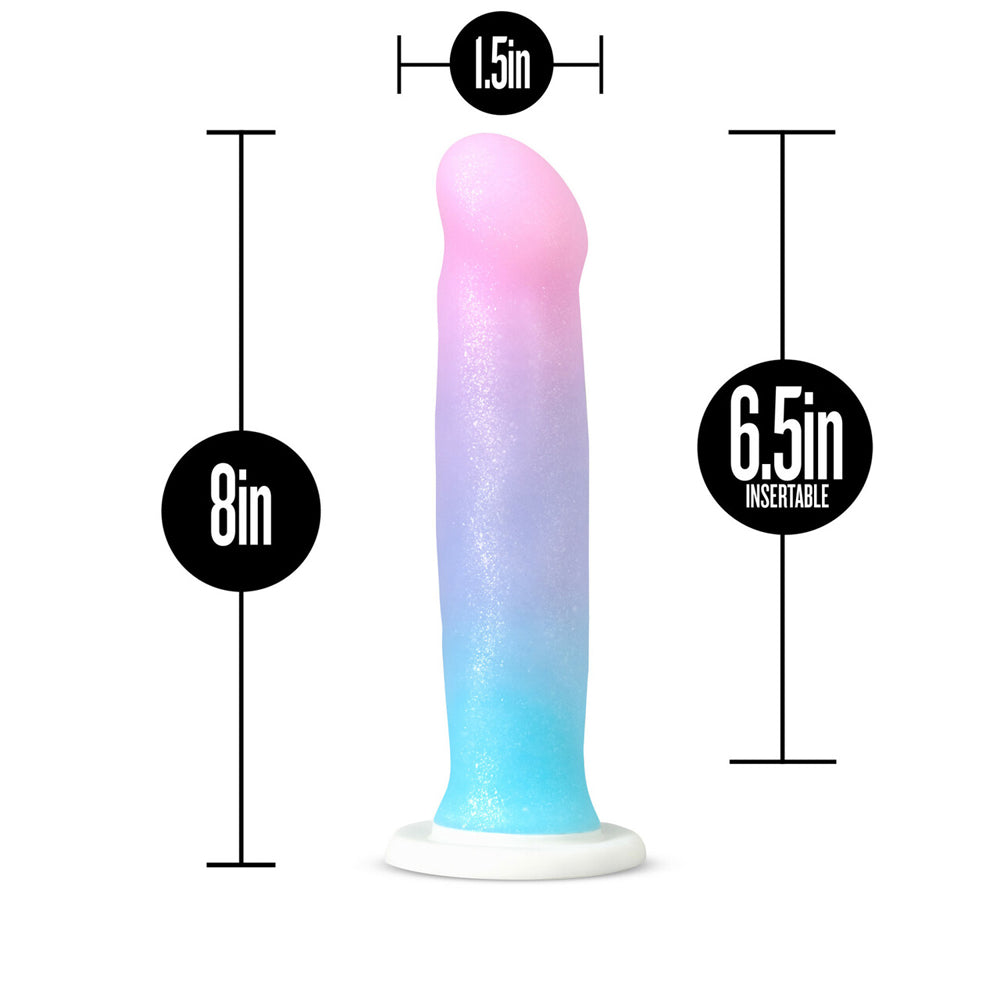 A sparkly ombre silicone dildo with suction cup, 8 inches long and 1.5 inches wide.