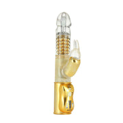 Gold and clear vibrator with a rabbit ear attachment and control panel.
