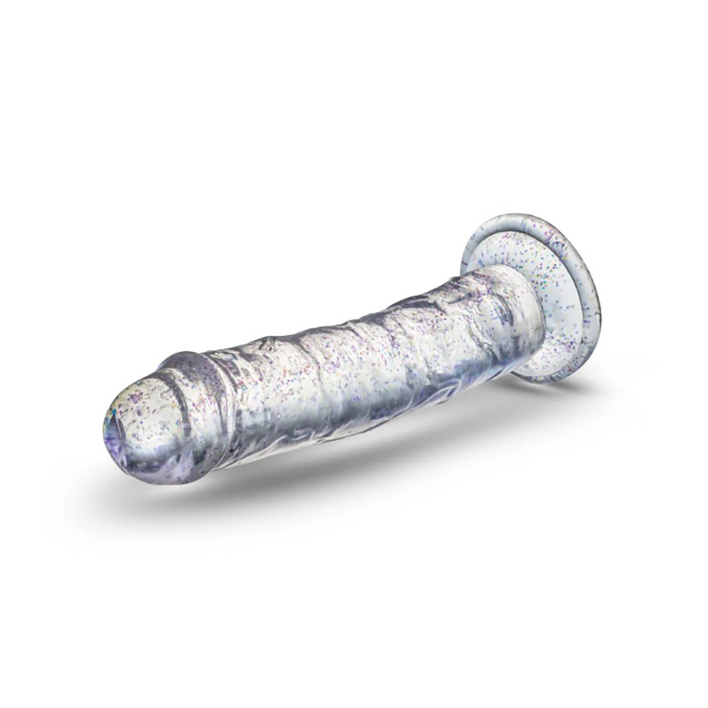 Clear flexible dildo with glitter and a suction cup base.