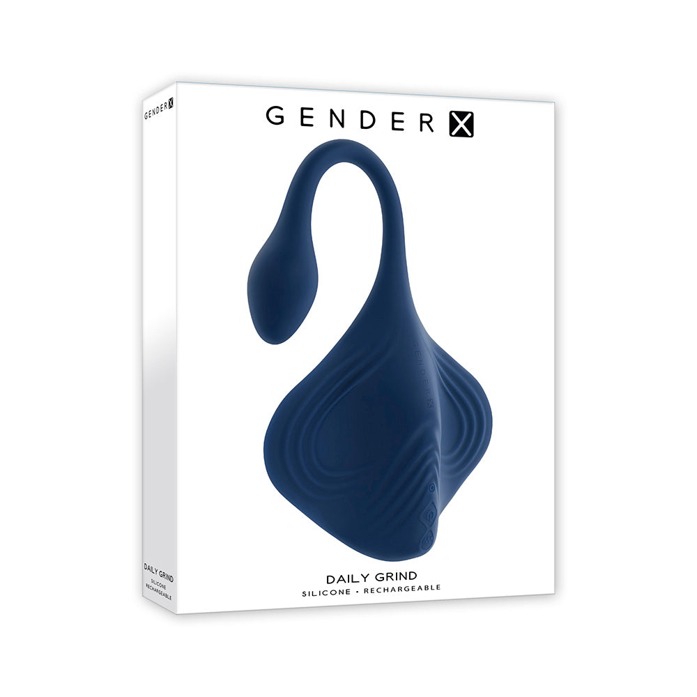 A navy blue Gender-X Daily Grind silicone toy on a white box.