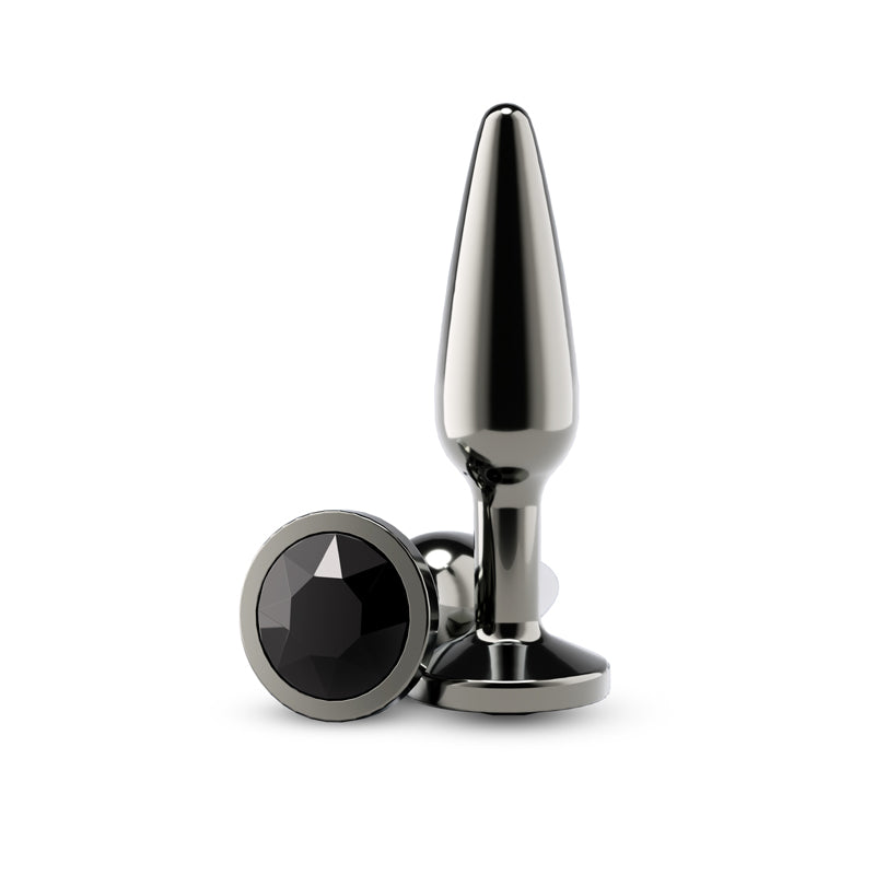 Tapered gunmetal black aluminum anal plug with a black gem accent.