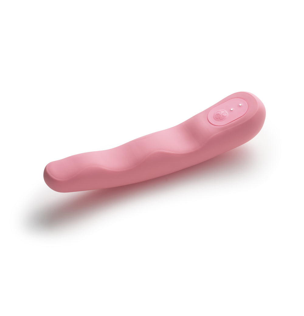 A pink, curved vibrator with a textured surface and control buttons.