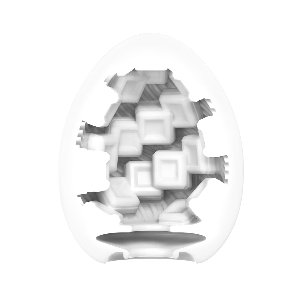 Tenga Cubic Textured Male Masturbator Egg with spiral edges.