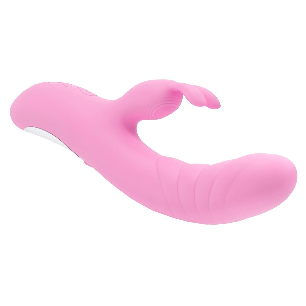 A pink rabbit vibrator with a curved shaft and dual stimulators.