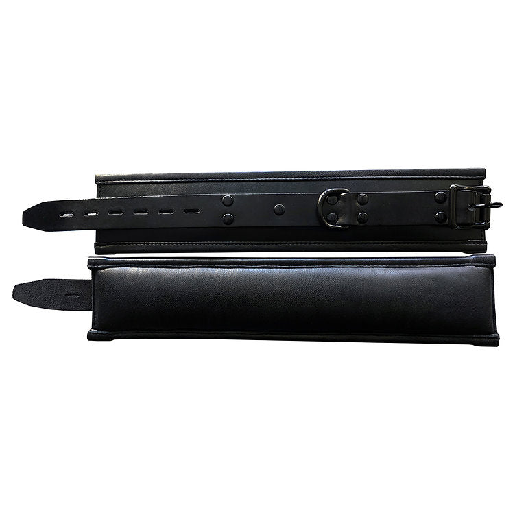 Black padded leather wrist cuffs with adjustable buckle closure.