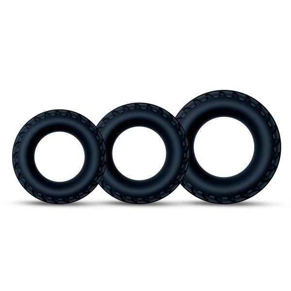Three black textured silicone cock rings of varying sizes.