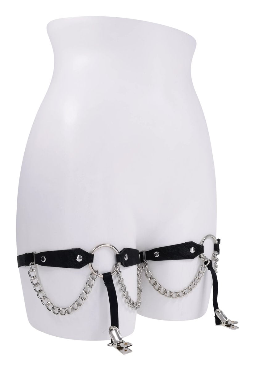Black faux leather garter belt with chains and clips on a mannequin.