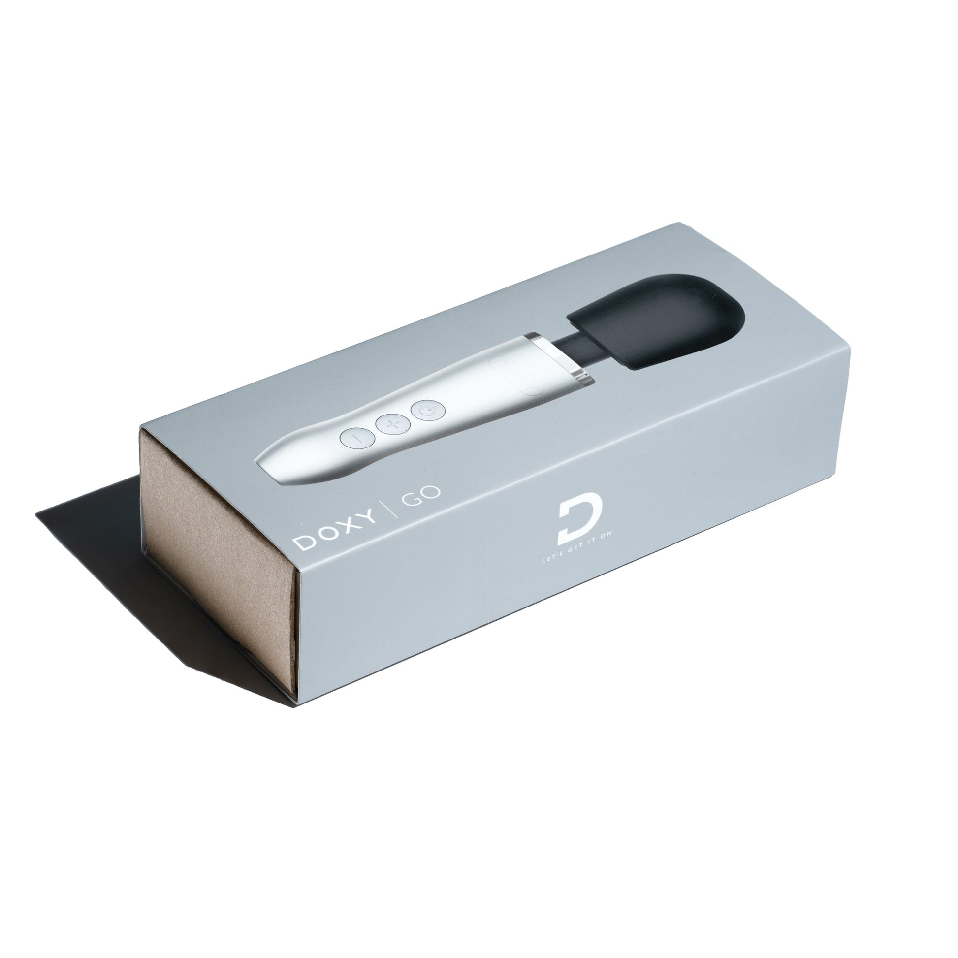 Doxy Go compact wand massager in brushed metal, shown in its packaging.