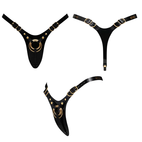 Glossy black leatherette strap-on harness with gold hardware.