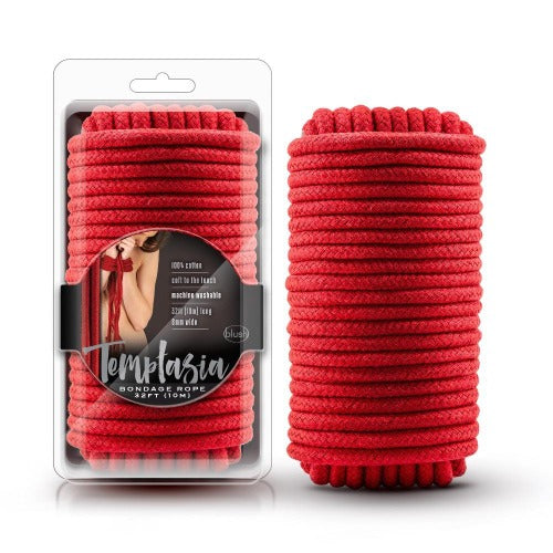 Red cotton bondage rope coiled in packaging and next to it.