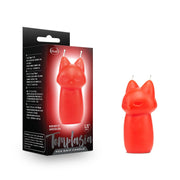 A red fox-shaped soy drip candle for sensation play.