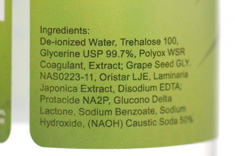 Ingredients list on a green background, including water, glycerine, and extracts.