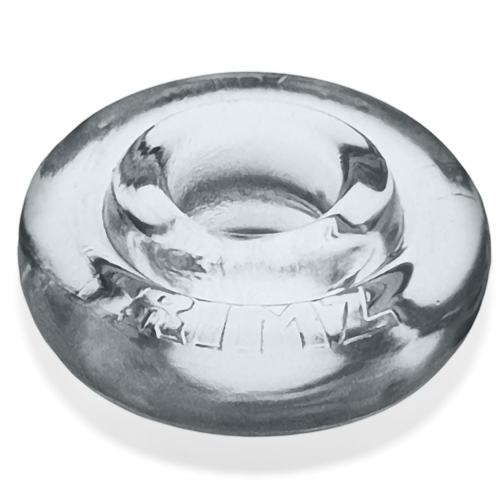 Clear rubber cock ring with embossed text.