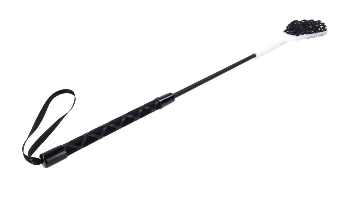 Black 19-inch impact whip with a white tip featuring a black lace silicone imprint and a wrist loop.